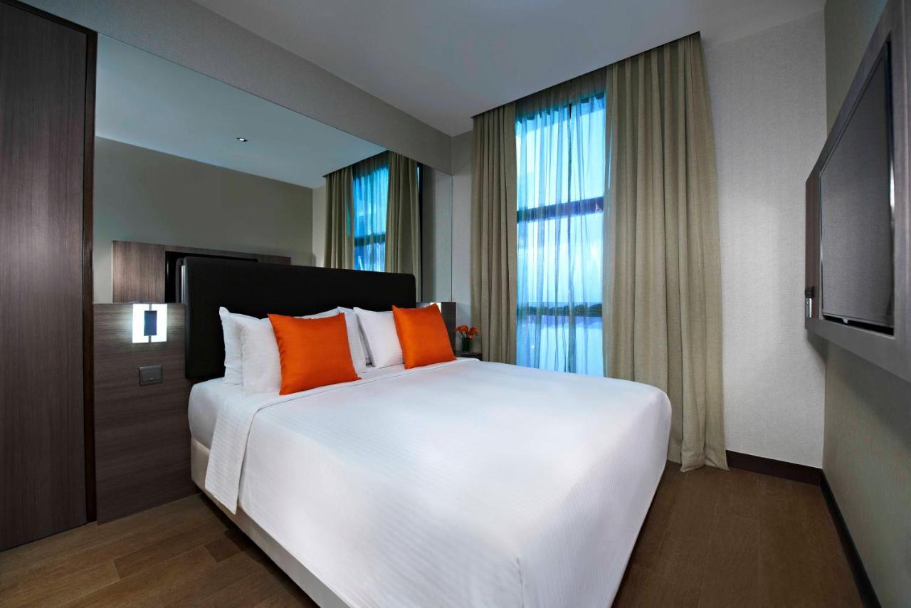 Amrise Hotel Kitchener Singapur Zimmer foto